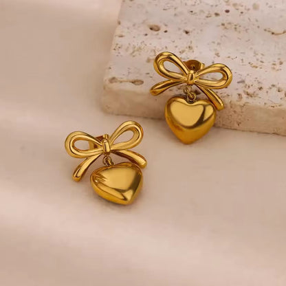 steel heart bow earrings