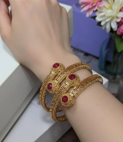 Gold plated stone bangles pair